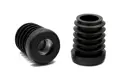 Two black plastic round tube inserts, with a metal threaded hole. One standing up and the other on its side showing the threaded hole.
