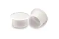 Two natural coloured plastic barrel plugs at different angles.