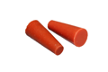 Two Orange Silicone Tapered plugs. Both on their side pointing different directions.
