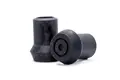 Side view of two black rubber injection moulded "Style D" feet with a flanged base.