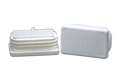 Two white plastic rectangular tube inserts. One standing up and one on its side.