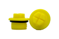 Two Yellow plastic BSP threaded plugs with rubber sealing O-Rings. One Standing, one on its side.