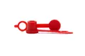 Side view of two red LDPE injection moulded grease nipple caps—one standing upright and one lying on its side.