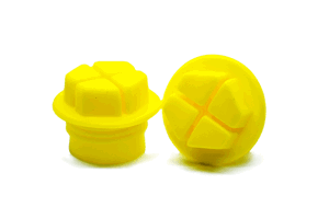 Two yellow plastic Metric Threaded plugs with a hex shaped head and recessed cross.
