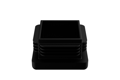 Angled view of a square black LDPE injection moulded chair leg insert.