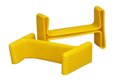 Pair of yellow pvc i shaped protection caps on white background.