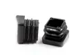 Side view of two square black plastic tube feet inserts with angled bases.