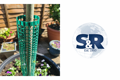 A young tree in a garden. With a plastic tree guard around the tree. The Sinclair & Rush logo next to the image.
