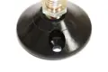Close up view of the mounting hole on the base of a tilt and glide adjustable foot.