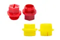 A selection of Plastic BSP threaded plugs in red and yellow.