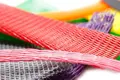 A selection of high stretch, plastic protecting netting. In various sizes. Pink, Red, Yellow, Orange, Grey and Green.