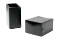 Side view of two black rectangular shiny plastic injection moulded chair feet with a flat bottom.
