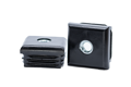 Two black plastic square tube inserts with metal threaded holes. One standing up, one on its side.