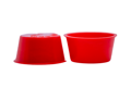 Two red plastic tapered plugs. Opposite ways up.
