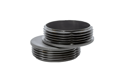 Two black plastic round tube inserts. One upside down on top of the other.