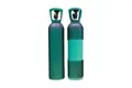 Two gas cylinders covered in black plastic protective netting.