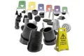 Collection of plastic feet for school chairs with a backdrop of school chairs and signs.