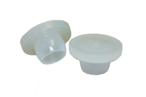Two natural coloured plastic barrel plugs at different angles.