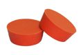 Two Orange Silicone Tapered plugs. One standing and one at an angle.