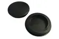 Two black flexible rubber blanking plugs on white background.