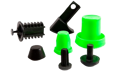 Collection of plastic moulded bespoke parts in black and bright green.