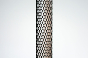Black plastic protective netting, stretched over a tube.